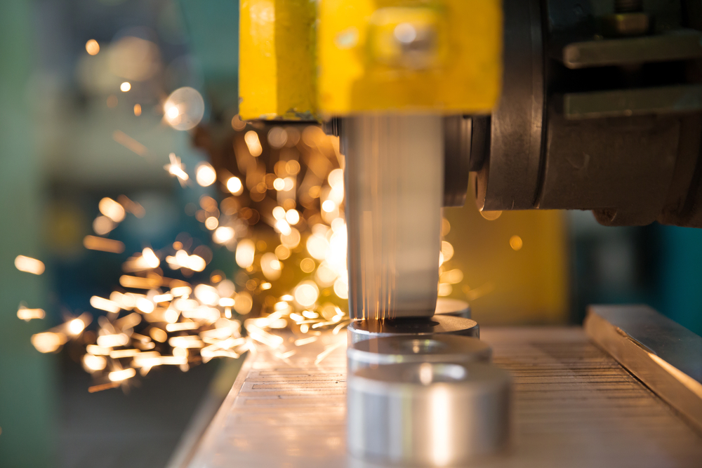 Metalworking,industry:,finishing,metal,working,on,horizontal,surface,grinder,machine