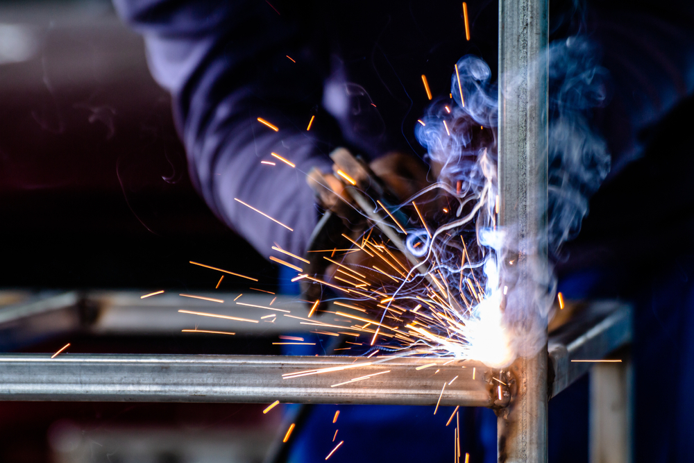 Welder,and,welding,sparks,,construction,and,metal,work,industrial,concept,