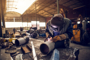Close,up,portrait,view,of,professional,mask,protected,welder,man